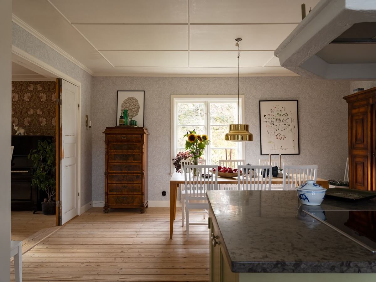 A 1930s Green-Painted Wooden Family Home in Sweden 6 open plan kitchen dining room