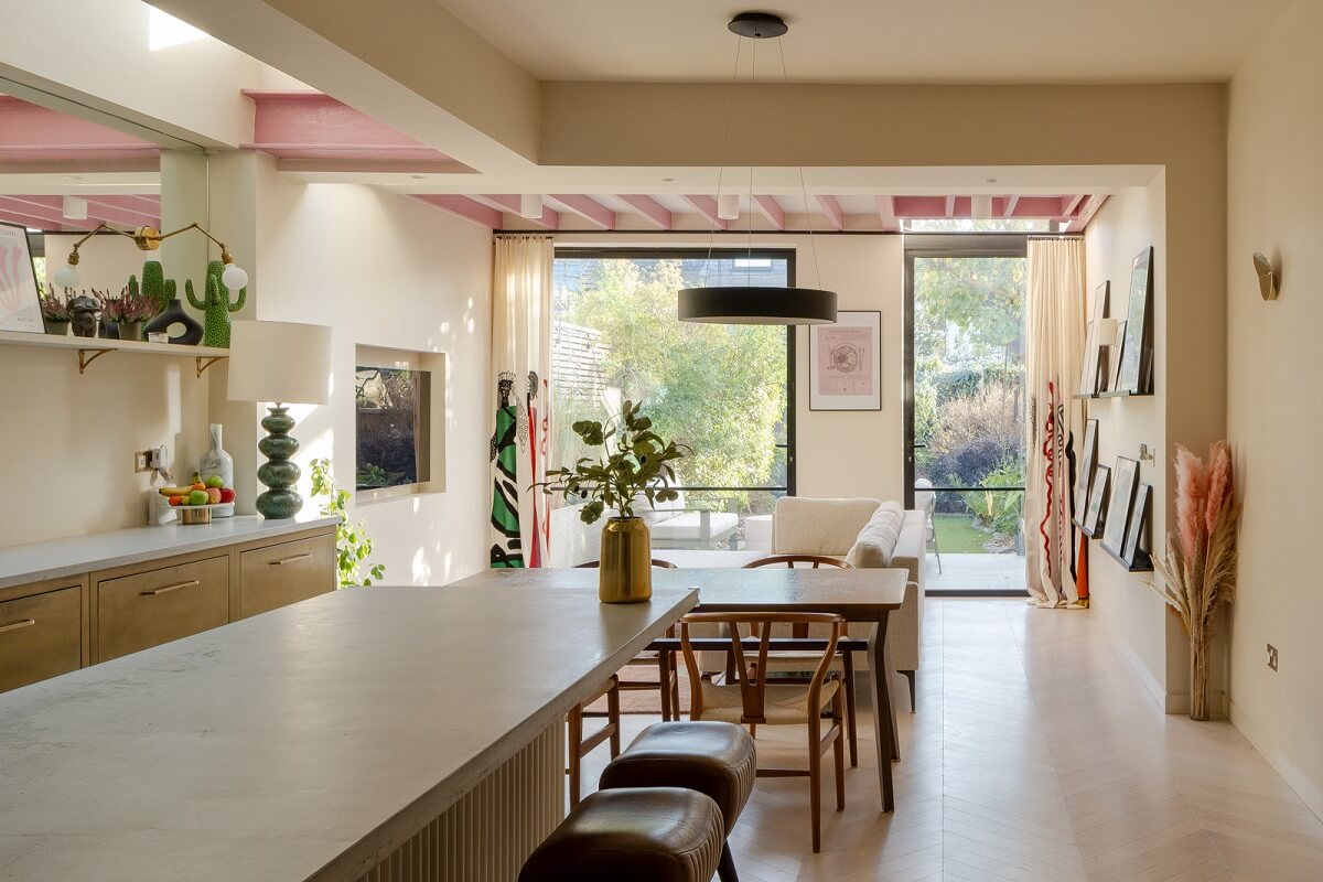 A Colorful Edwardian Family Home in London 4 open plan kitchen with sitting area and island