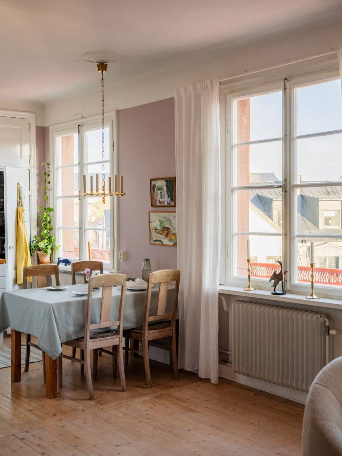 A Living Room with Light Purple Walls in a Swedish Apartment 5 open plan living room and kitchen