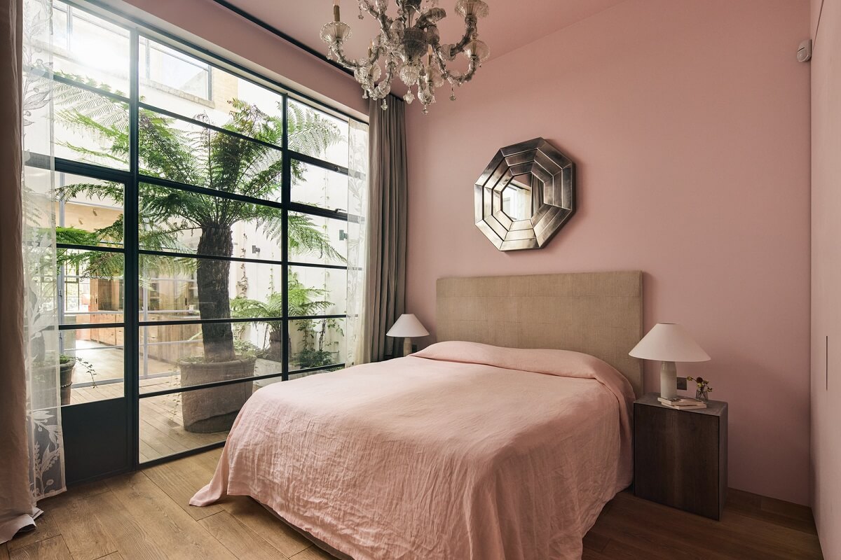 A Grand Industrial Warehouse Conversion in London 38 pink bedroom with industrial style windows