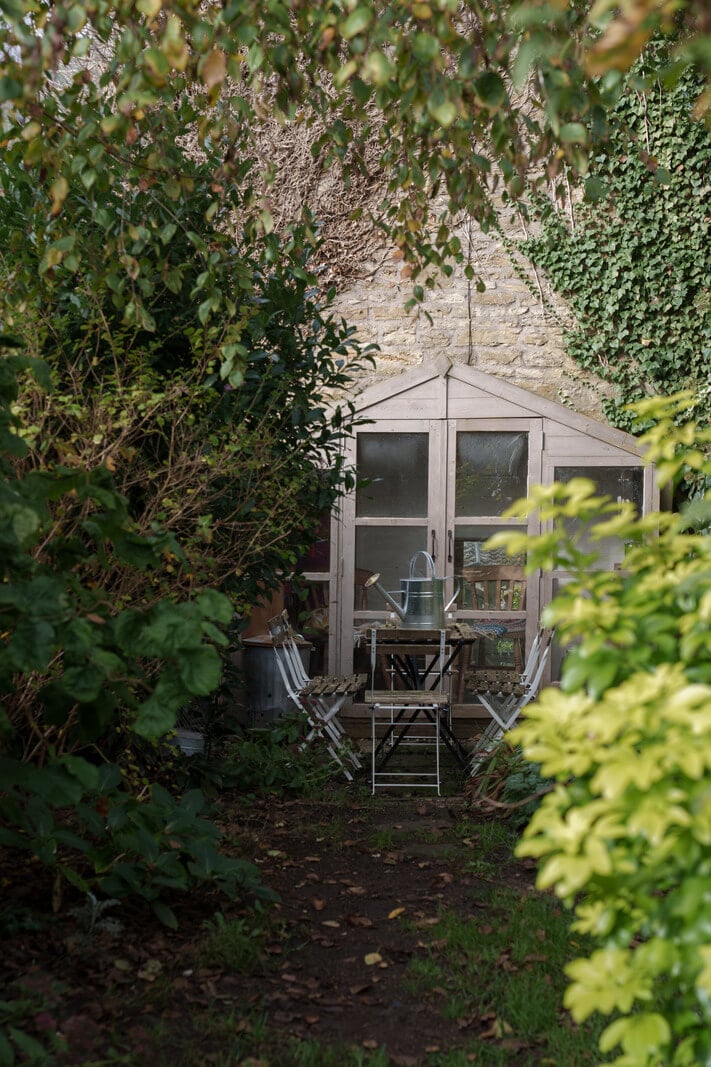 Colorful Furniture in a Historic English Cottage 20 private garden with seating Colorful Furniture in a Historic English Cottage