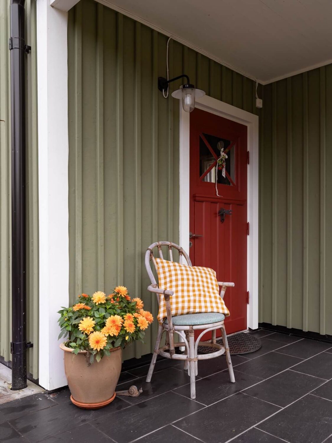 A 1930s Green-Painted Wooden Family Home in Sweden 26 red front door