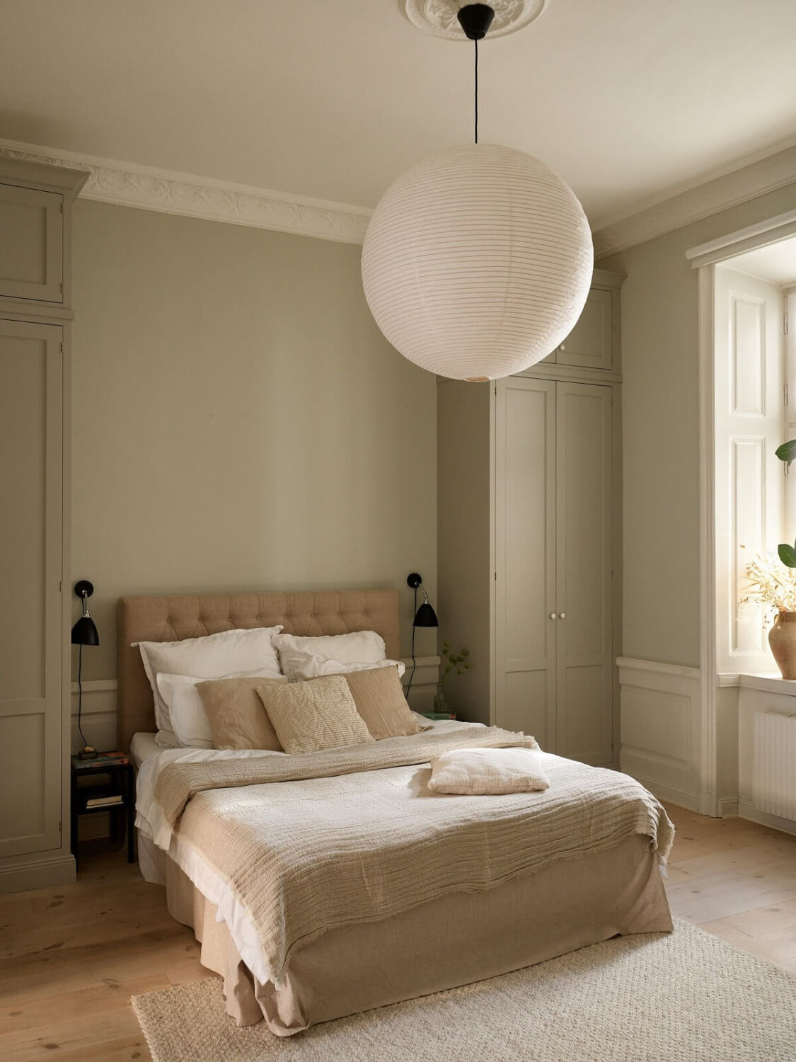 A Light Corner Apartment with 1890s Period Features 18 serene light gray bedroom built in wardrobes
