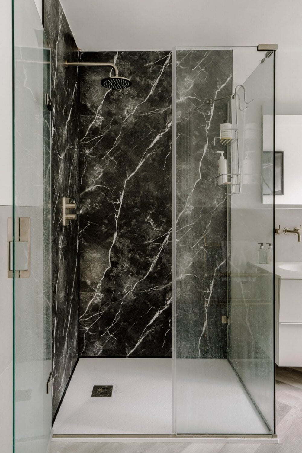 A Grand Arts and Crafts House in London 16 shower black marble A Grand Arts and Crafts House in London