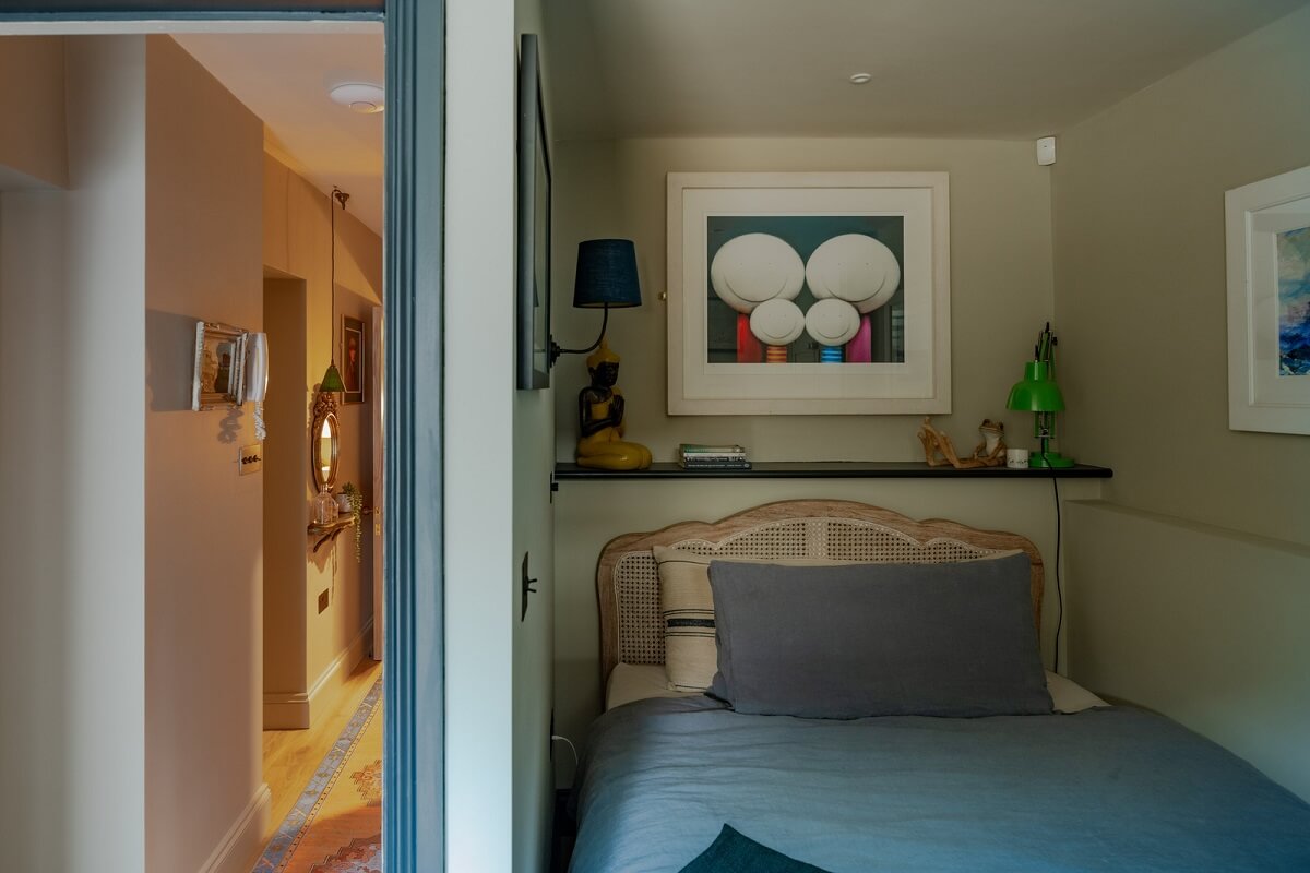 Eclectic Interiors in a Historic Bristol Apartment 19 small bedroom with shelf above bed