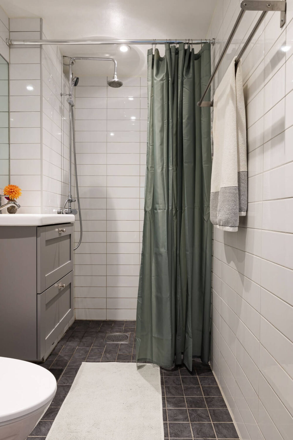 Soft Colors in a Charming Corner Apartment in Stockholm 21 small gray and white bathroom Soft Colors in a Charming Corner Apartment in Stockholm