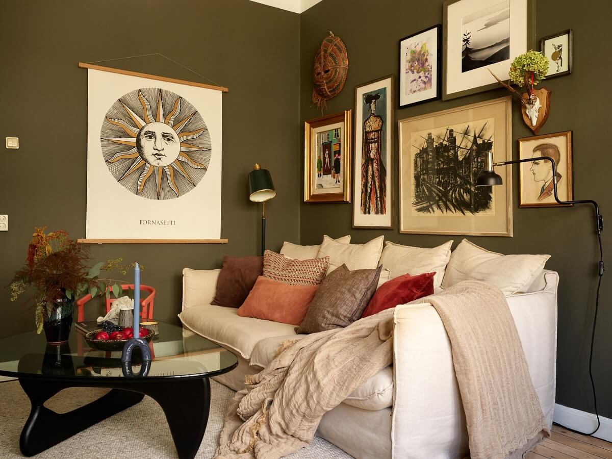 A Lovely Apartment Owned By The Same Family for Almost 100 Years 1 small green living room gallery wall