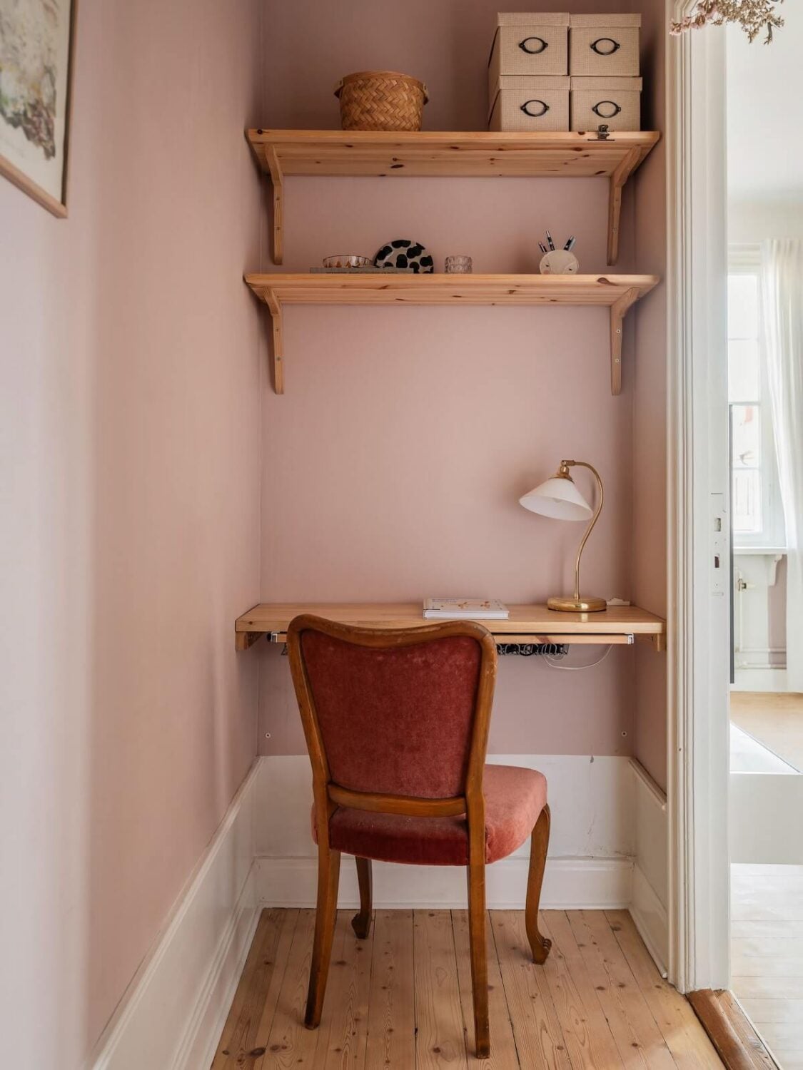 A Living Room with Light Purple Walls in a Swedish Apartment 9 small pink home office with floating wooden desk