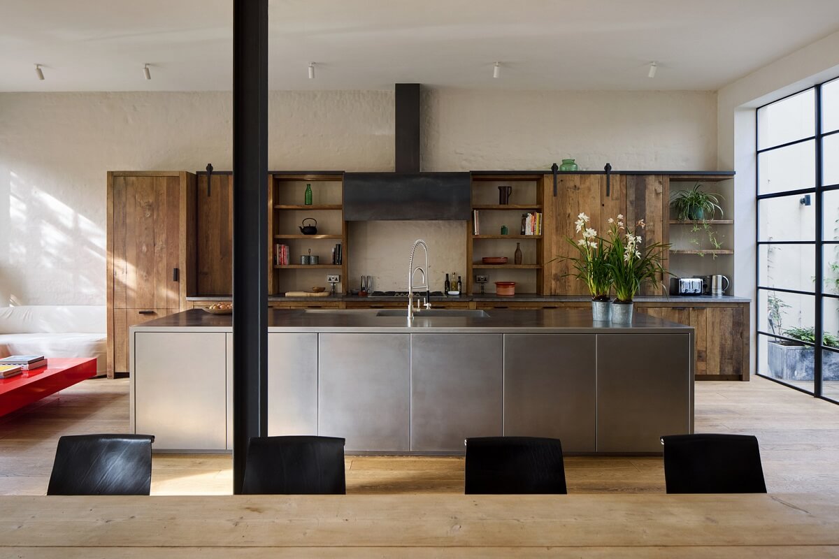 A Grand Industrial Warehouse Conversion in London 3 stainless steel kitchen island
