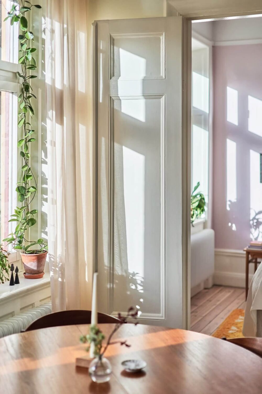 A Light Swedish Apartment with a Yellow Kitchen 9 sunlight flooding in apartment