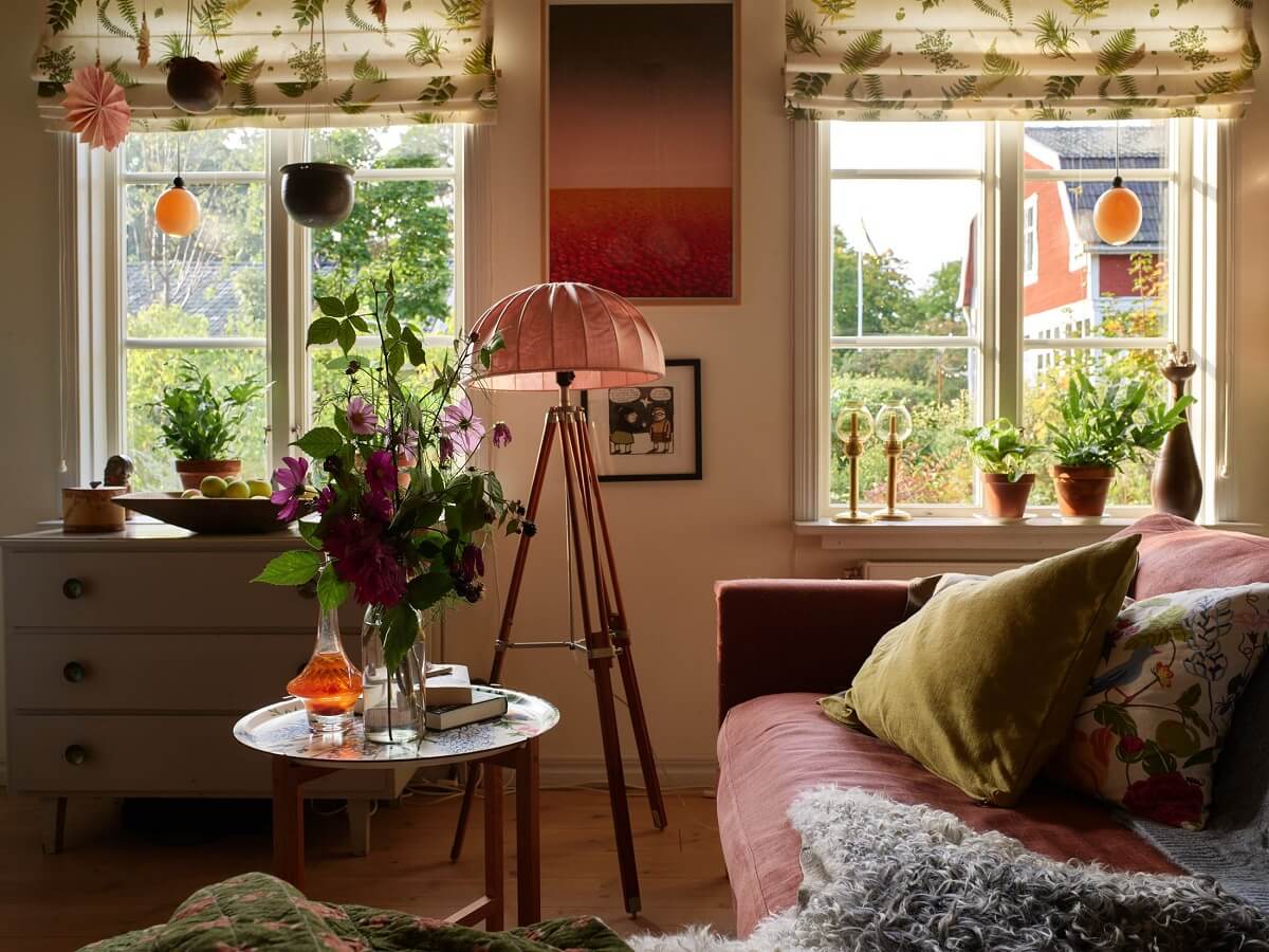 A Charming Swedish Cottage Filled with Art and Color 2 swedish cottage living room