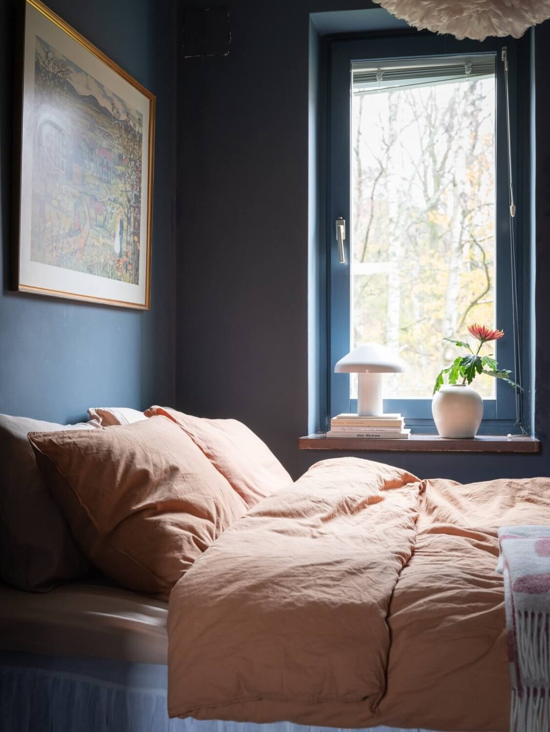 A Small Swedish Apartment with Dark Blue Walls 12 tiny blue bedroom