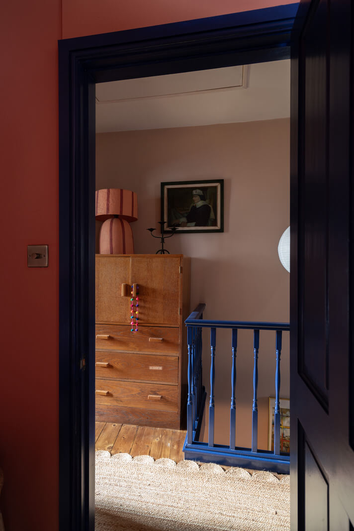 Colorful Rooms and Period Features in a London Terrace House 18 view into landing