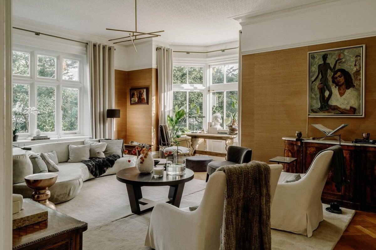 A Grand Arts and Crafts House in London 2 warm living room large windows wallpaper