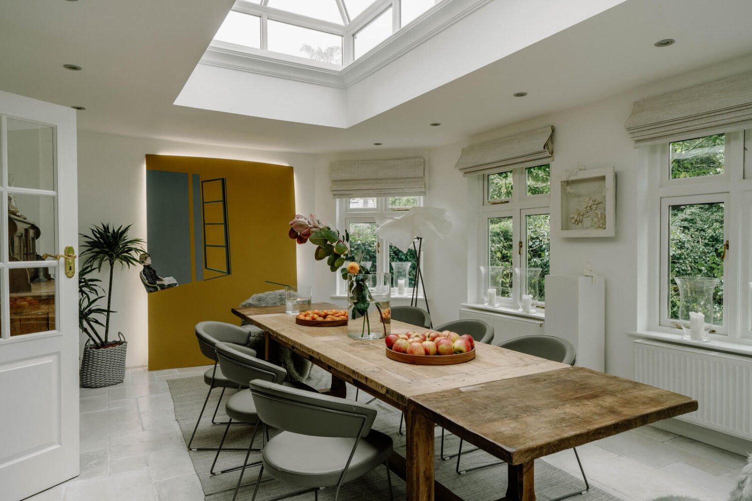A Grand Arts and Crafts House in London 9 white dining room with skylight