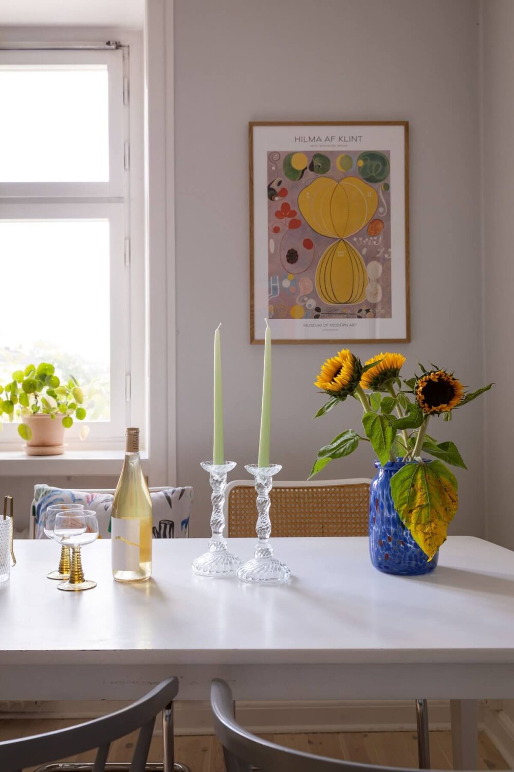Soft Colors in a Charming Corner Apartment in Stockholm 6 white dining table