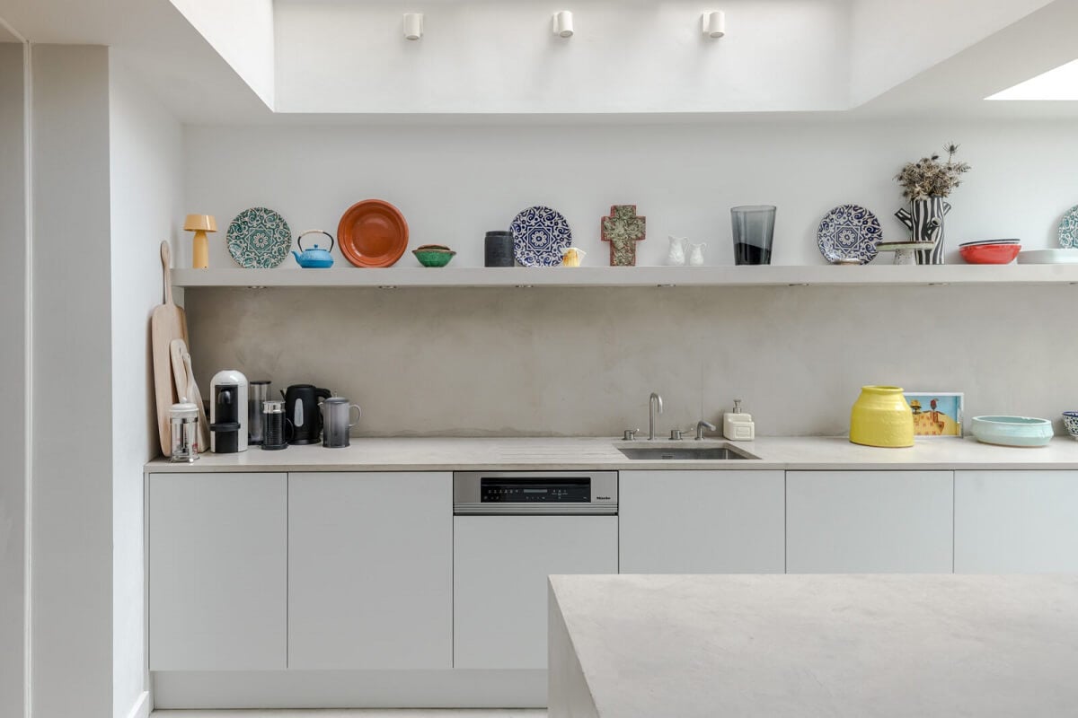 A Bright Extended and Renovated Victorian House in London 5 white kitchen with shelf