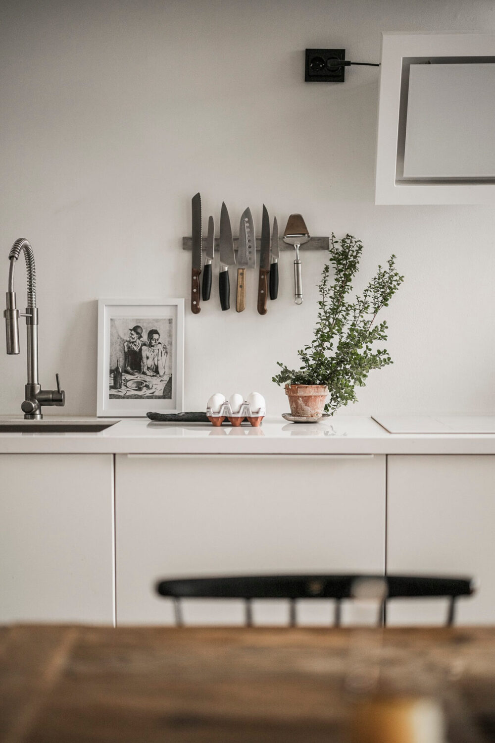 A Scandinavian Loft in an Old Industrial Building 10 white minimalistic kitchen