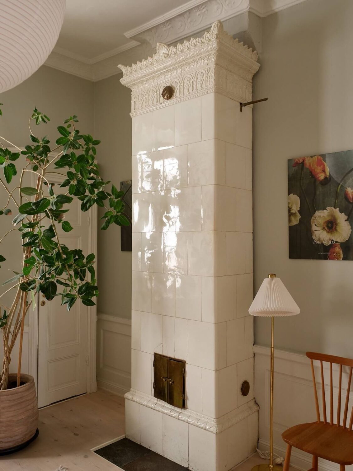 A Light Corner Apartment with 1890s Period Features 20 white tiled fireplace