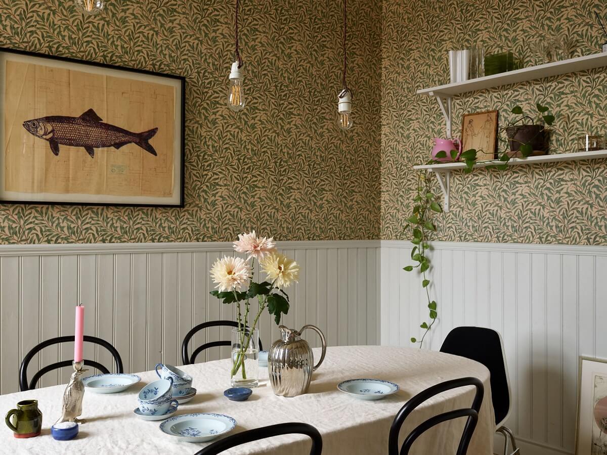 A Colorful Turn-of-the-Century Family Apartment in Stockholm 18 william morris wallpaper dining room shelves