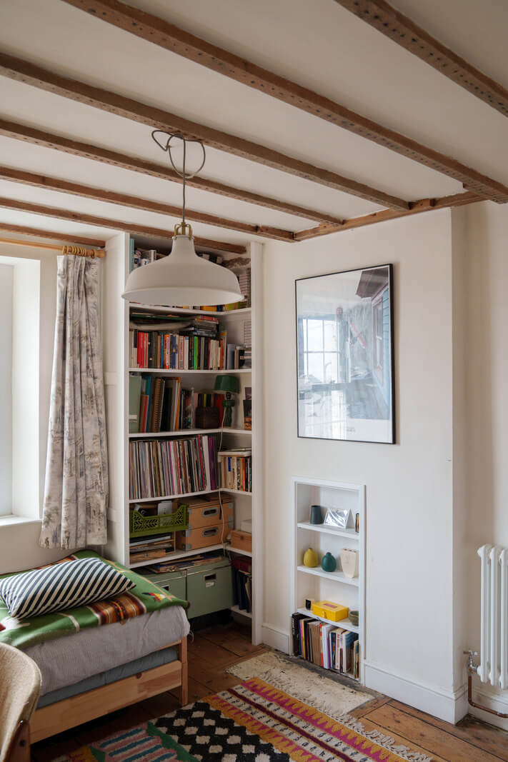 Colorful Furniture in a Historic English Cottage 11 wooden ceiling beams guest room