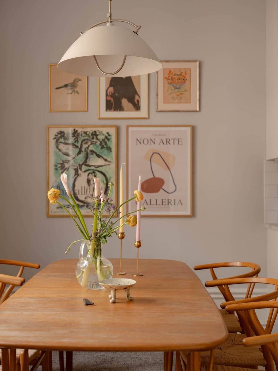 A Spacious Stockholm Apartment with Light Gray Walls 11 wooden kitchen table