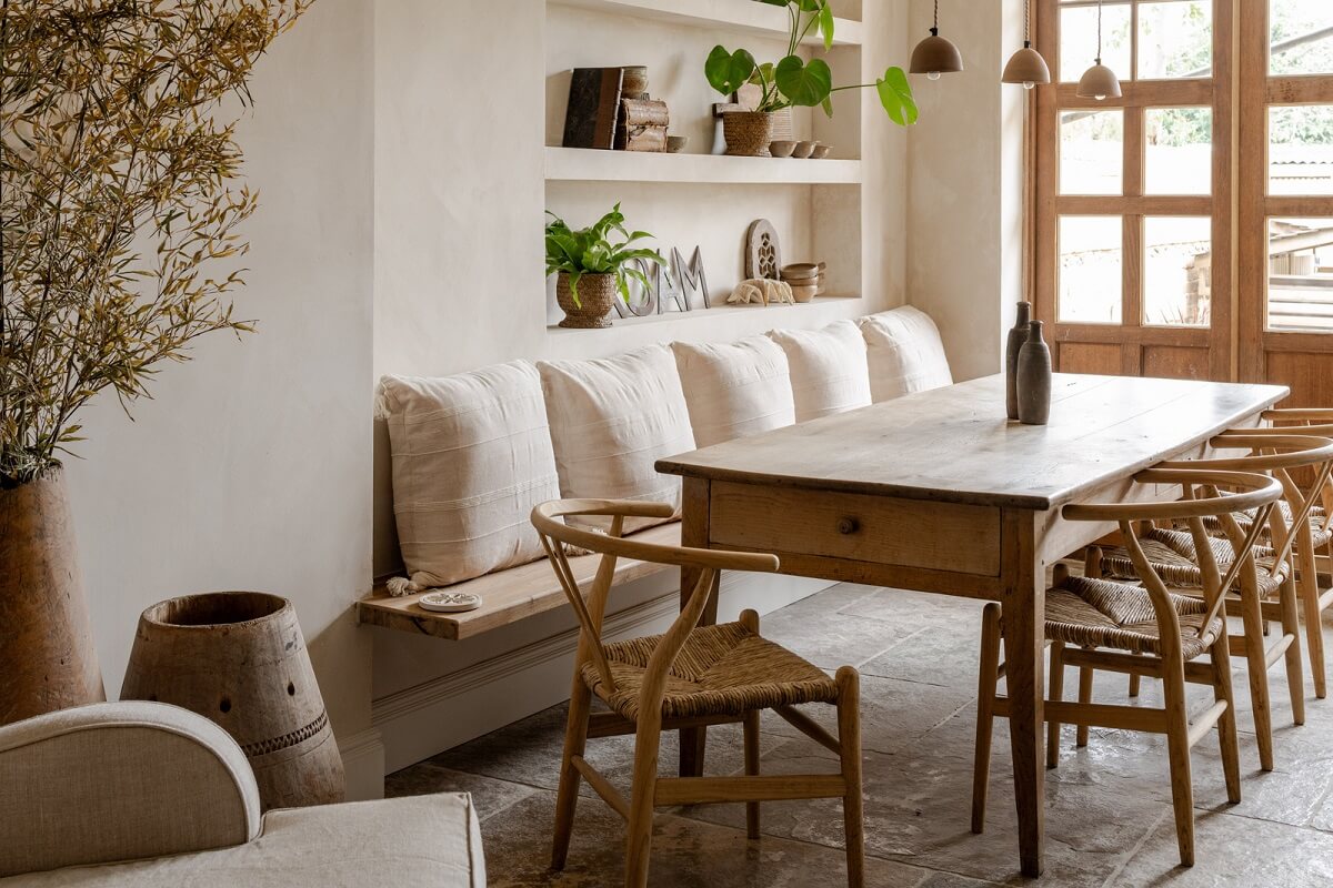 Serene Spaces with Limewash Walls in an English Victorian Home 4 wooden kitchen table and built in seating bench