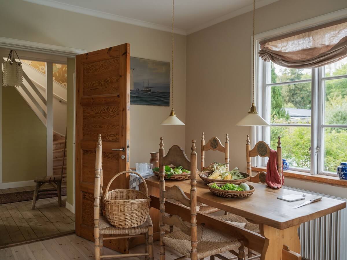 A Romantic 1920s Villa with Views of the Lake 13 wooden kitchen table