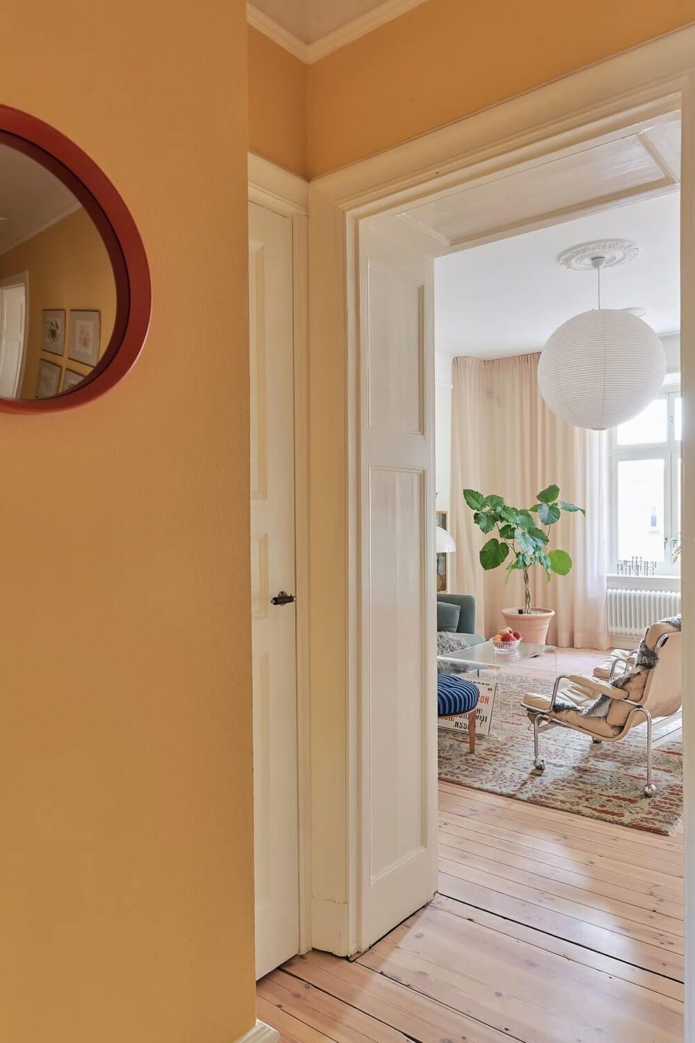 A Light Swedish Apartment with a Yellow Kitchen 8 yellow hall and living room