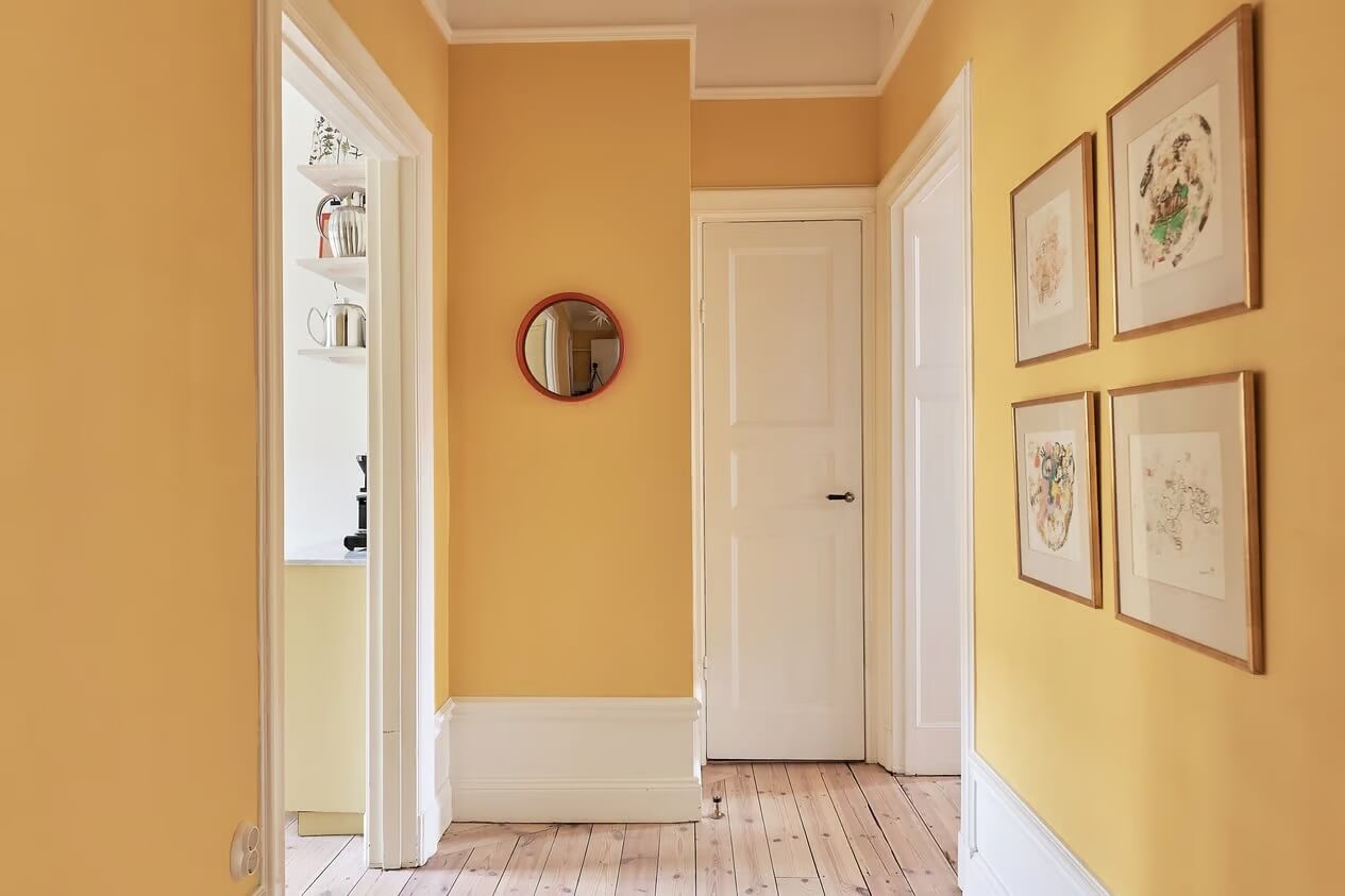 A Light Swedish Apartment with a Yellow Kitchen 19 yellow hall