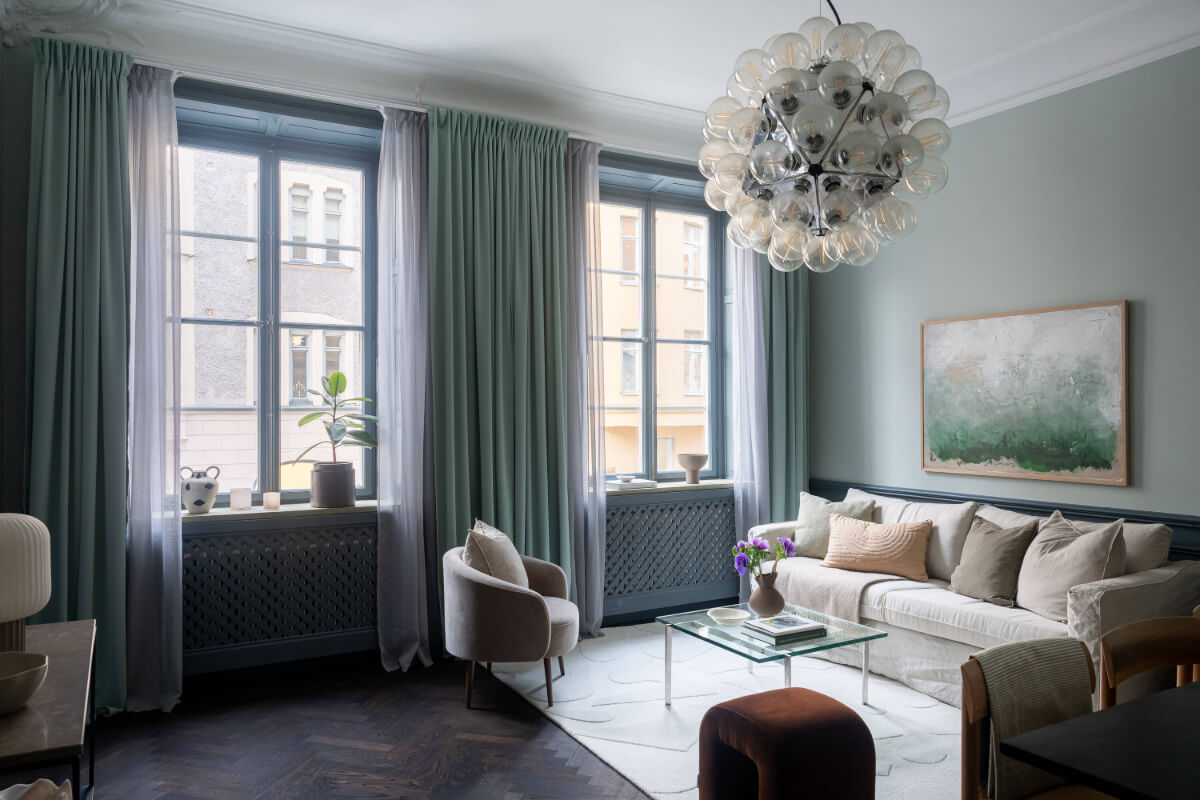 A Moody Color Palette in a Stylish One-Bedroom Apartment in Stockholm 4 a moody color palette in a scandi living room A Moody Color Palette in a Stylish One-Bedroom Apartment in Stockholm