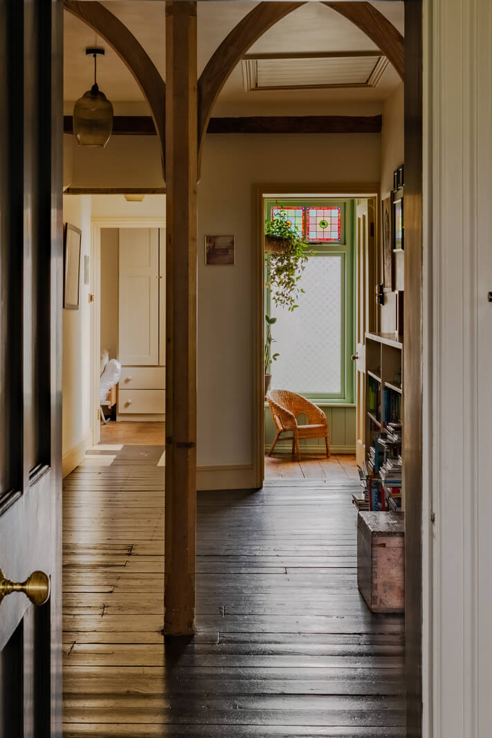 A Strong Color Palette in a Unique Country House in Cornwall 20 arched beams