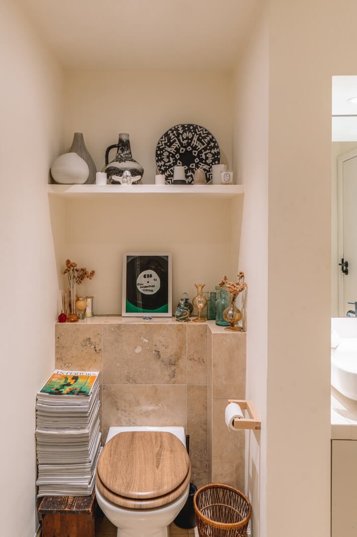 A Charming Garden Apartment in North Kensington 17 bathroom with shelf above toilet