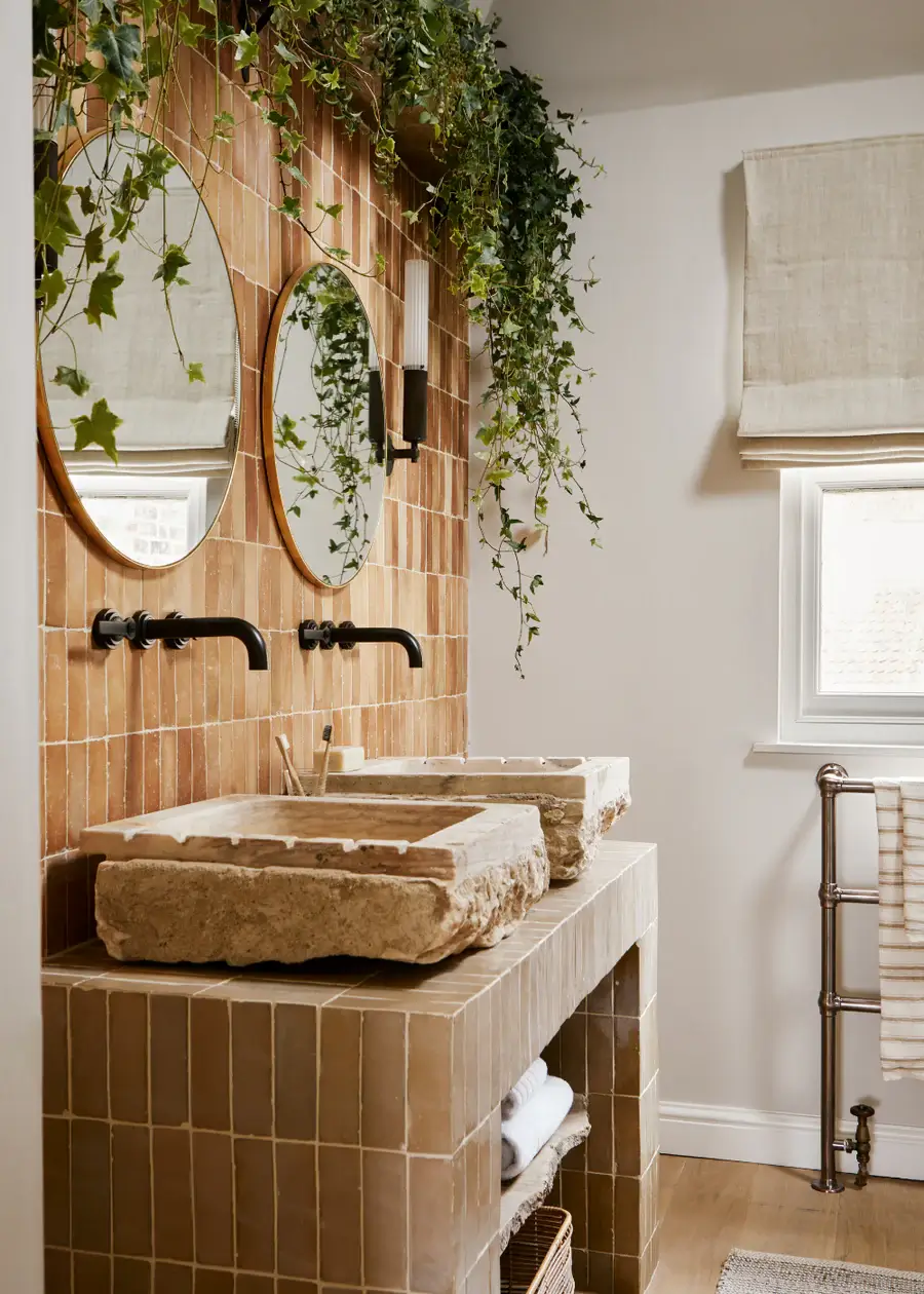 The Color Trends for 2025: Warm, Natural Shades and a Cheerful Accent 80 bathroom with tiles in various brown shades nordroom The Color Trends for 2025: Warm, Natural Shades and a Cheerful Accent
