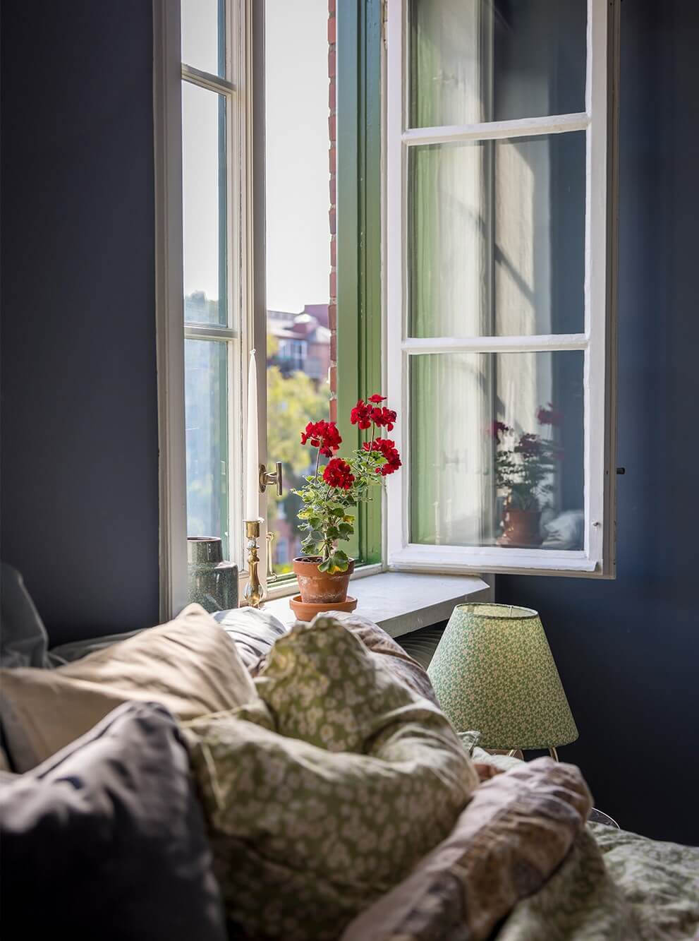 A Spacious Nordic Apartment with a Wonderful Color Palette 11 bedroom window detail
