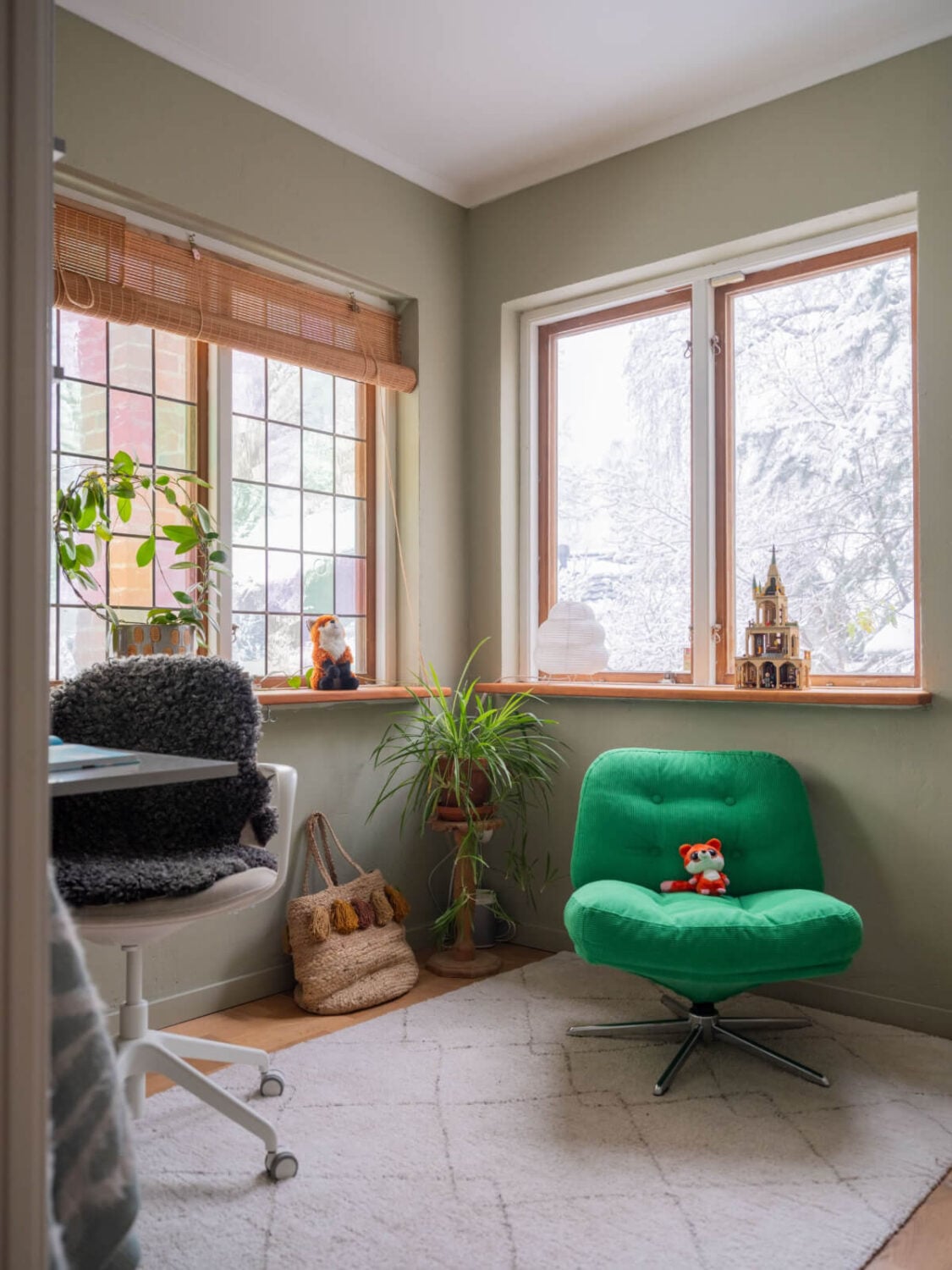 A Beautiful Midcentury Family Home South of Stockholm 25 bedroom with desk and green ikea swivel chair