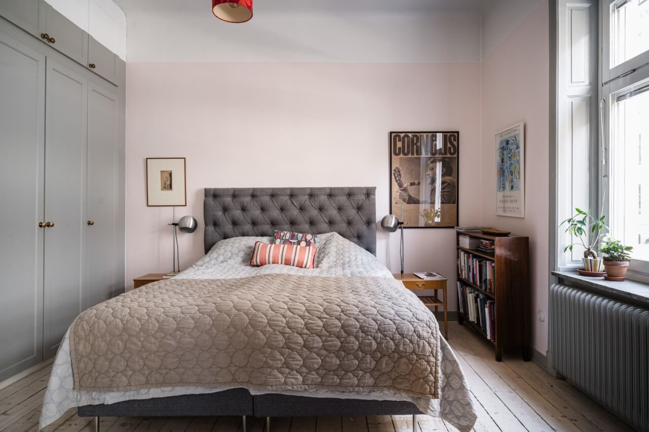 7 Simple Tricks To Make a Low Ceiling Look Taller 22 bedroom with light pink wall and built in wardrobes