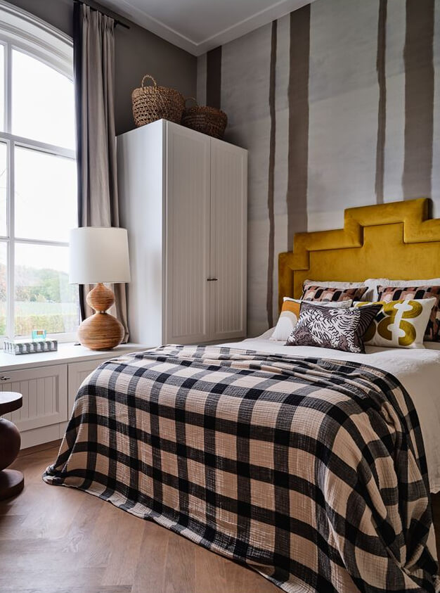 An Amazing Family Home in a Former Dutch Train Station 18 bedroom with ochre headboard
