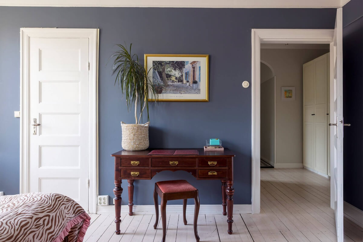 A Spacious Nordic Apartment with a Wonderful Color Palette 14 blue bedroom with antique desk nordroom
