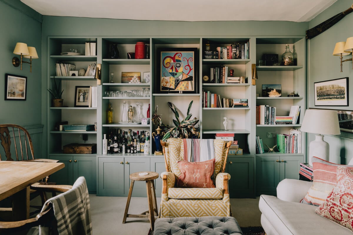 booksheves in small green living room nordroom