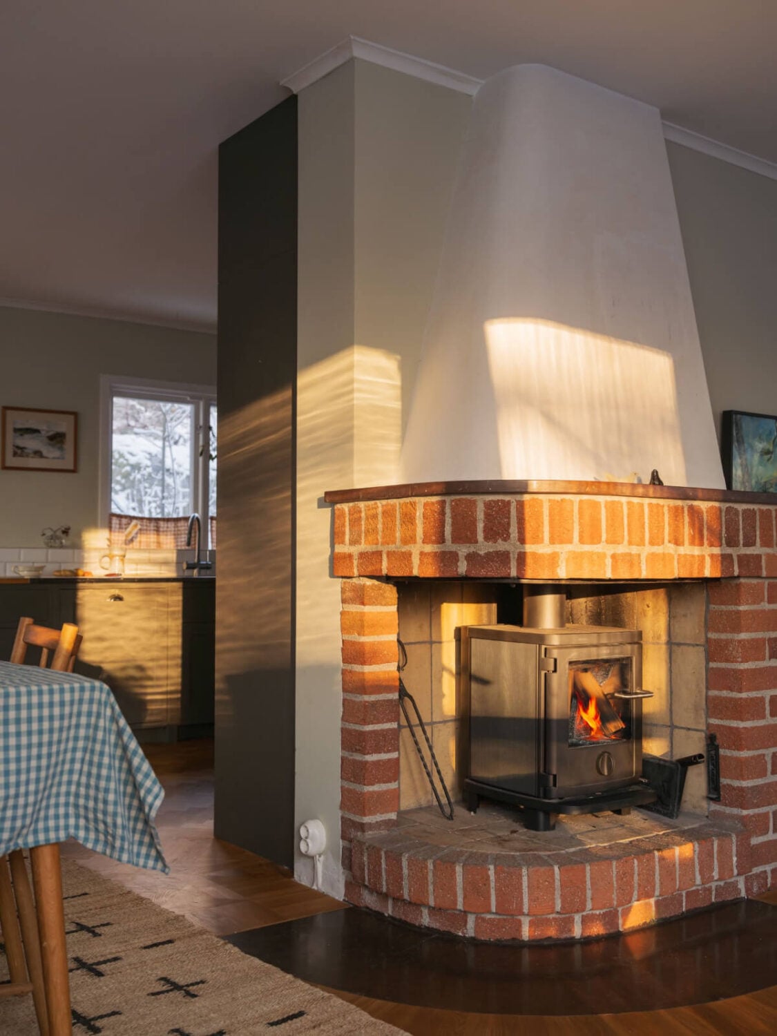 A Beautiful Midcentury Family Home South of Stockholm 11 brick fireplace