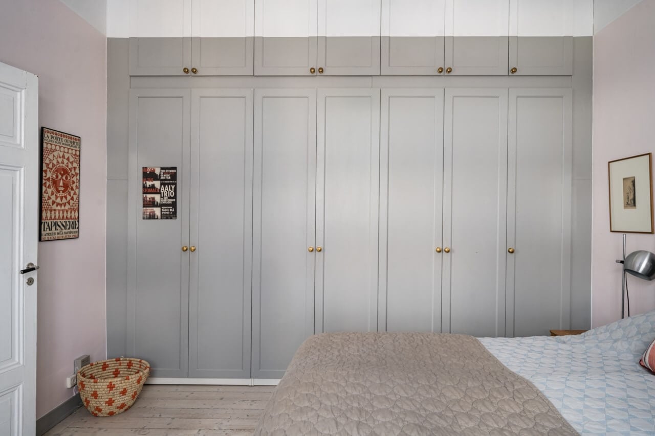 Muted Tones, Art, and Books in a Charming Stockholm Apartment 11 built in bedroom wardrobes