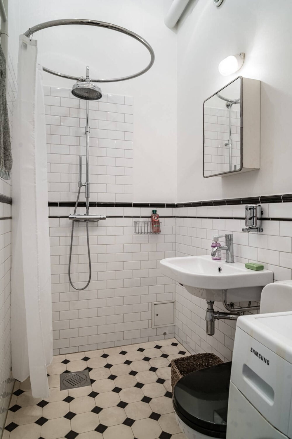 Muted Tones, Art, and Books in a Charming Stockholm Apartment 19 classic black and white bathroom Muted Tones, Art, and Books in a Charming Stockholm Apartment