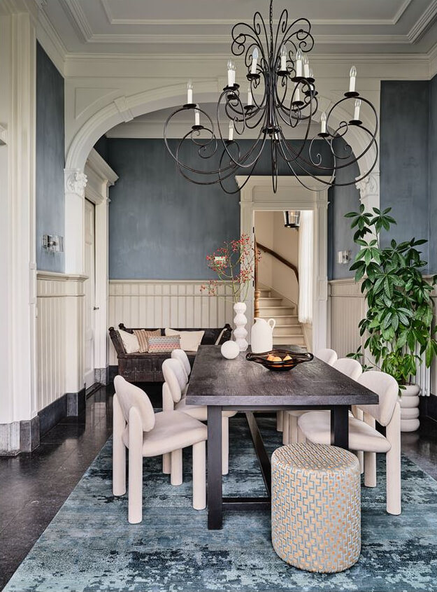An Amazing Family Home in a Former Dutch Train Station 4 classic modern dining room with blue walls period features classic arch nordroom