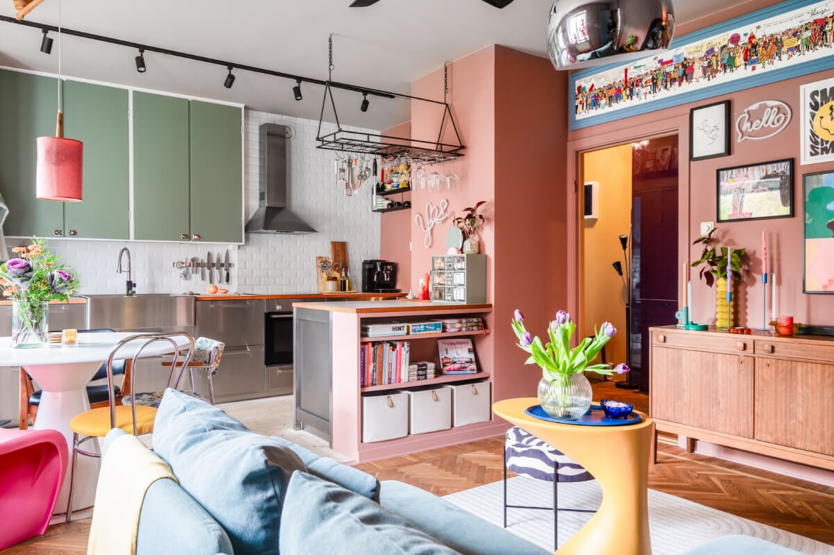 A Vibrant, Colorful Midcentury Apartment in Malmö 3 colorful living room with earthy pink walls