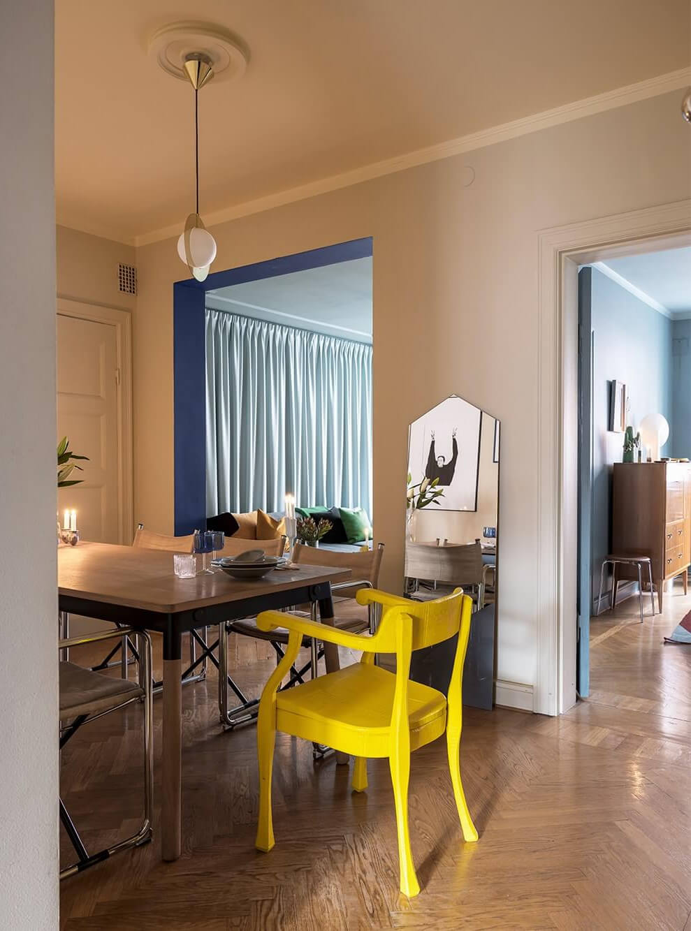 An Interior Designer's Moody Apartment with Period Features 9 dining room with bold yellow accent chair