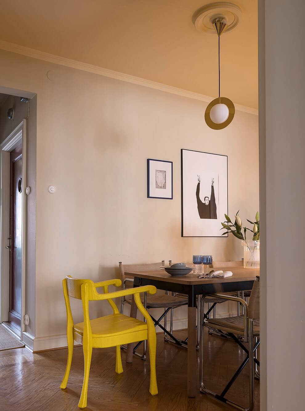 An Interior Designer's Moody Apartment with Period Features 8 dining room with yellow chair