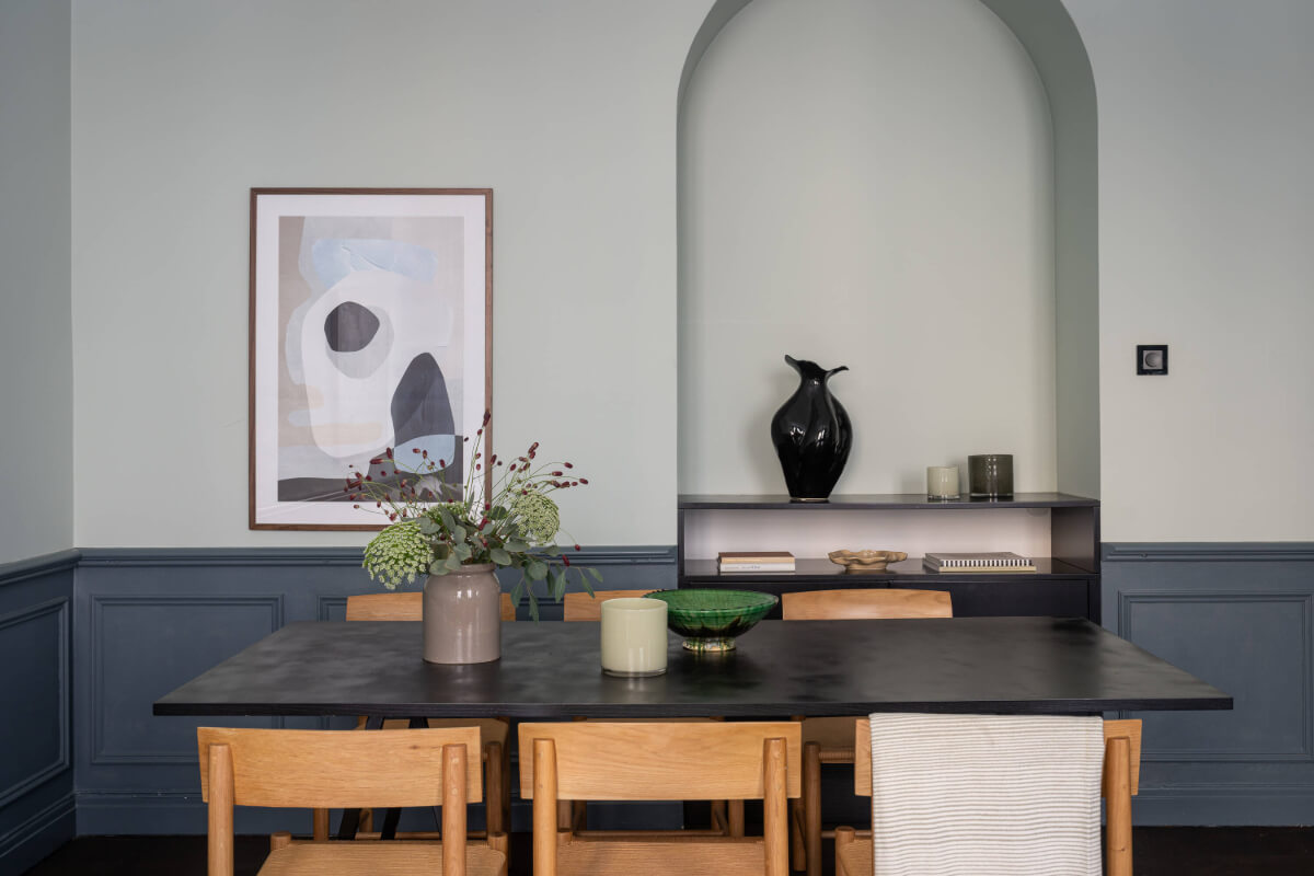 A Moody Color Palette in a Stylish One-Bedroom Apartment in Stockholm 6 dining table detail