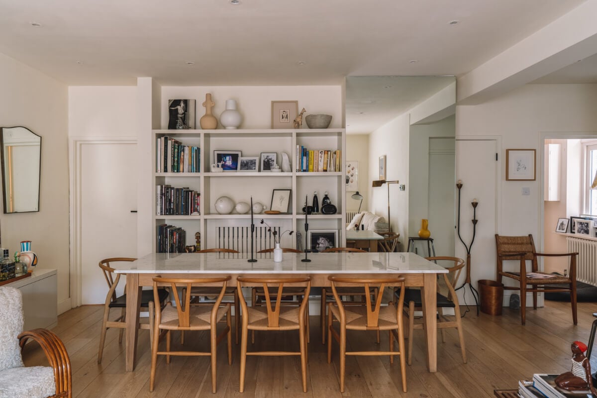 A Charming Garden Apartment in North Kensington 6 dining table with bookshelves