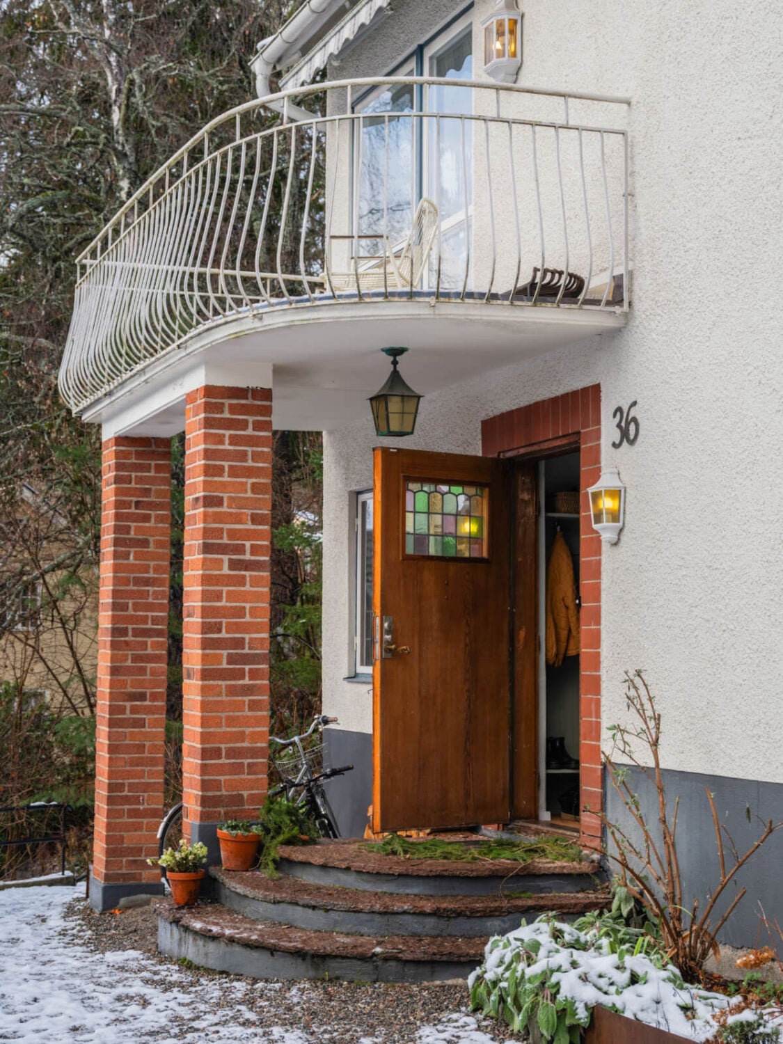 A Beautiful Midcentury Family Home South of Stockholm 34 front door porch